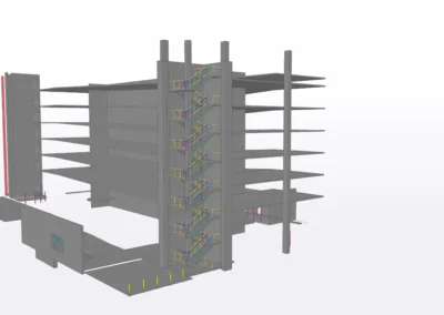3D architectural model of a multi-story building featuring exposed staircases and structural elements, showing various construction details.